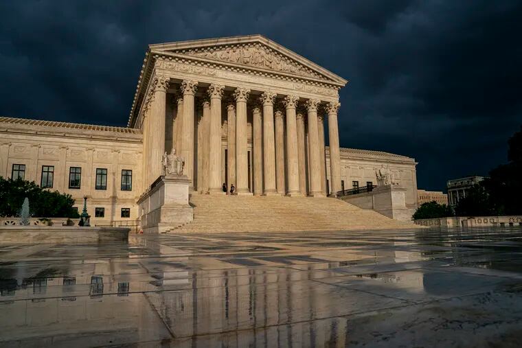 The Supreme Court is seen under stormy skies in Washington. The Supreme Court is taking up the first major abortion case of the Trump era, an election-year look at a Louisiana dispute that could reveal how willing the more conservative court is to roll back abortion rights.