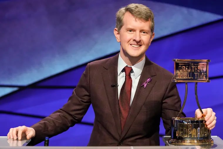 Ken Jennings poses with a trophy on "JEOPARDY! The Greatest of All Time." Jennings, the veteran who beat young hotshot James Holzhauer and Brad Rutter, won the $1 million prize in the tournament that stretched out over four entertaining nights on ABC's prime-time schedule.
