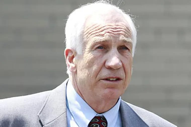 Jerry Sandusky leaves the Centre County Courthouse in Bellefonte on Thursday afternoon. (David Swanson/Staff Photographer)