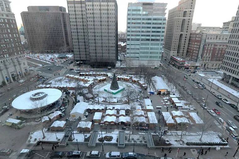 Architect James Rappoport's plan for seven restaurants in LOVE Park would fill the square year-round like the Christmas Village does during the holiday season. (Clem Murray/Staff Photographer)