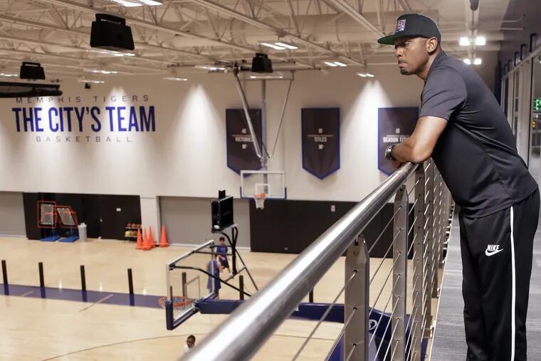 FILE – In this June 8, 2018, file photo, Memphis basketball coach Penny Hardaway looks over the team's practice facility in Memphis, Tenn. Hardaway finally can turn his attention to basketball with the Memphis Tigers hitting the court Tuesday, Sept. 26, to start fall practice. (AP Photo/Mark Humphrey, File)