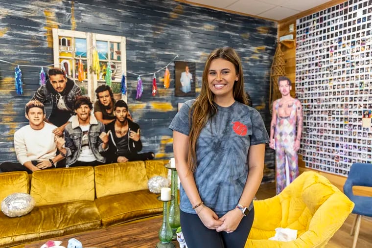 Mattia Krappa, 25, owner of Lucca Fresca, at her smoothie cafe in Taylor, Pa. Krappa opened up shop in 2020, pulling inspiration from a lifelong love of boy bands — especially One Direction — for the menu and decor.