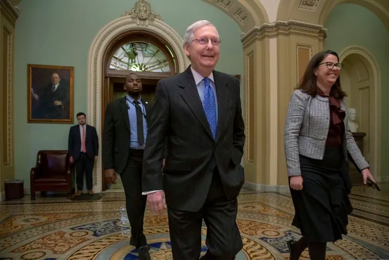 Senate Majority Leader Mitch McConnell, R-Ky., leaves the chamber after accusing Democrats of turning President Donald Trump's promised border wall into "something evil" to avoid dealing with the security and humanitarian crisis at the southern border, on Capitol Hill in Washington, Tuesday, Jan. 15, 2019. (AP Photo/J. Scott Applewhite)
