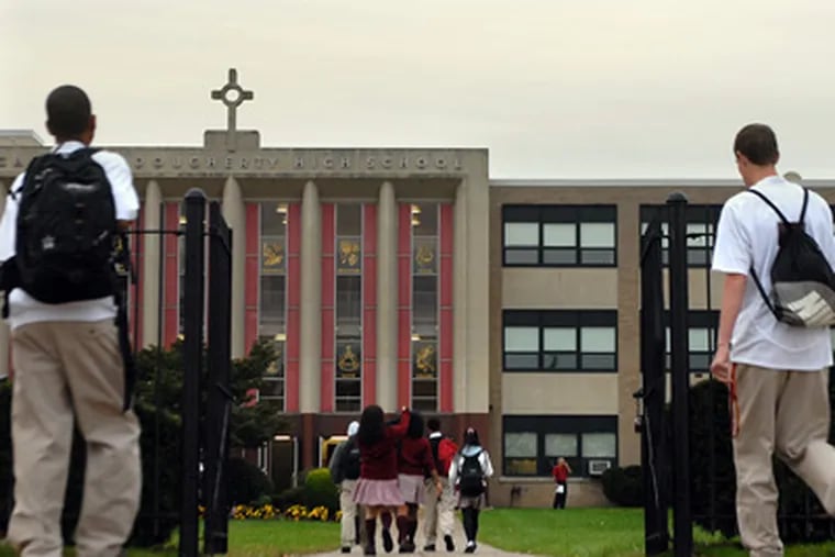 Students arriving at Cardinal Dougherty High School for the start of school today after Cardinal Justin Rigali announced the closures of the school and Northeast Catholic High School for Boys in Frankford. ( Tom Gralish / Staff Photographer )