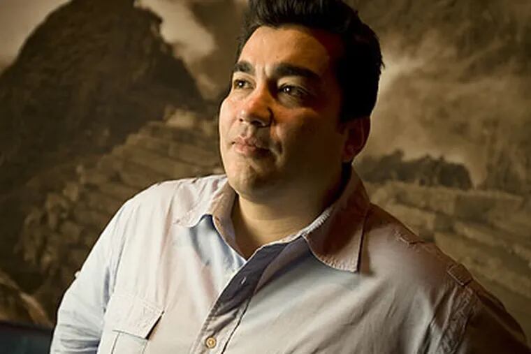 "I'm an optimist," chef Jose Garces says of his upcoming ventures. (Eric Mencher/Staff Photographer)