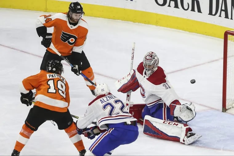 Nolan Patrick (19) gets a power play goal past Canadiens’ goalie Carey Price to tie in the second period on Tuesday. The Flyers would win in overtime.