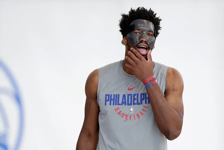 Joel Embiid, here during practice on April 13, will play against the Heat on Thursday.