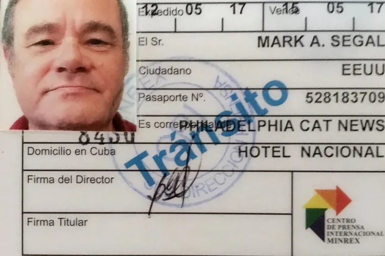 Mark Segal, founder and Publisher of the Philadelphia Gay News, is listed as being with the Philadelphia Cat News on a Cuban press credential.