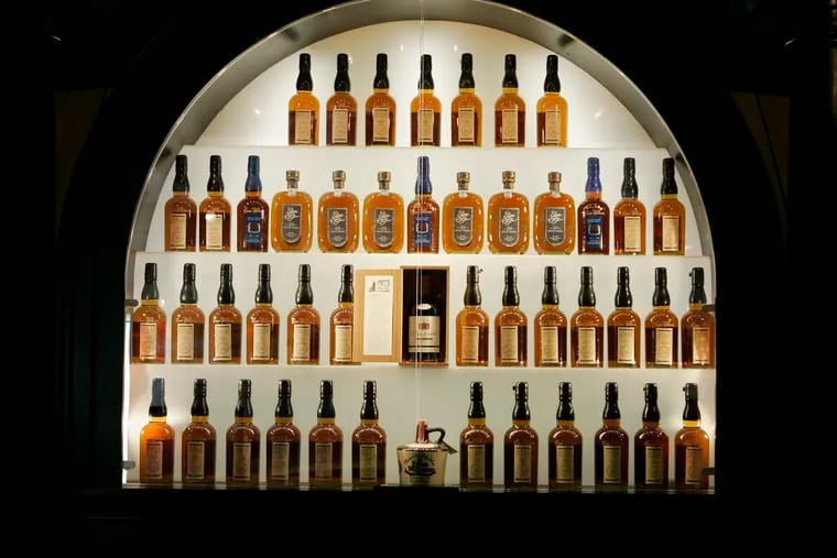 In this file photo, bottles of bourbon are shown in a display case at the Heaven Hill Bourbon Heritage Center in Bardstown, Ky.  The PLCB is raffling off the chance to buy a rare bottle of Heaven Hill straight corn whiskey, among other brands.