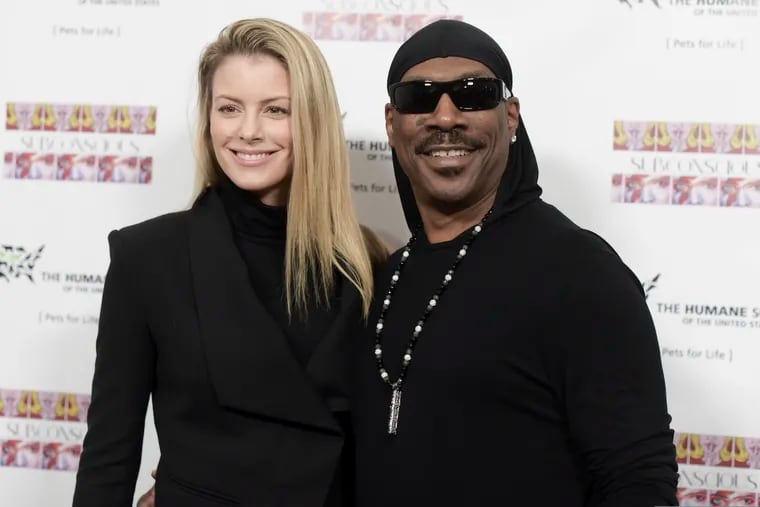 FILE - In this Nov. 20, 2016, file photo, Paige Butcher, left, and Eddie Murphy attend "SUBCONSCIOUS" by Bria Murphy Gallery Opening at Lace Gallery in Los Angeles. Murphy and his fiancee Butcher have a new baby boy. The couple released a statement through Murphy’s publicist Monday, Dec. 3, 2018, saying Max Charles Murphy was born Friday, Nov. 30 and weighed 6 pounds, 11 ounces. (Photo by Richard Shotwell/Invision/AP, File)