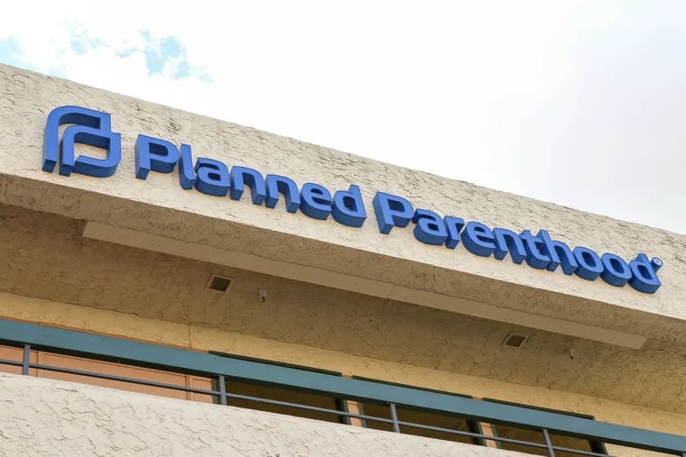 Federal prosecutors in Delaware have charged an 18-year-old man with throwing a lit incendiary device at a Planned Parenthood in Newark, Del.