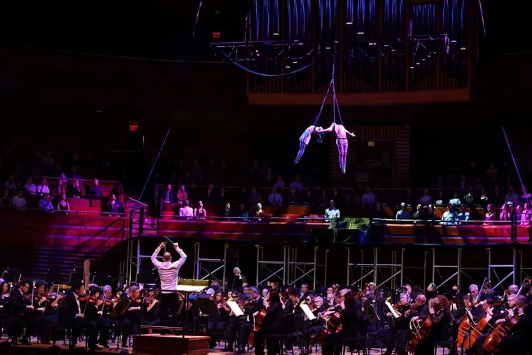 Yannick Nézet-Séguin conducts the Philadelphia Orchestra as Brian Sanders' JUNK dancers Julia Higdon (Juliet) and Teddy Fatscher (Romeo) fly above.