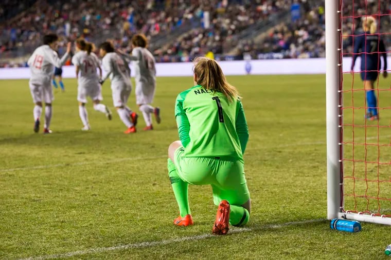 United States goalkeeper Alyssa Naeher watches as Japan celebrates the late goal that left the Americans with a 2-2 tie in the SheBelieves Cup at Talen Energy Stadium.