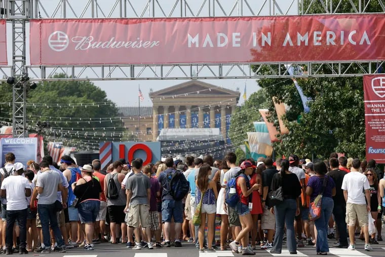 FILE – In this Sept. 1, 2012, file photo, people line up to enter the "Made in America" music festival, with the Philadelphia Museum of Art visible in the distance on the Benjamin Franklin Parkway in Philadelphia. Jay-Z, who founded the festival in 2012, is expressing disappointment after Philadelphia city officials confirmed Tuesday, July 17, 2018, that the annual Labor Day weekend music festival will no longer be held on the Benjamin Franklin Parkway in "the heart of the city" after the 2018 event, according to The Philadelphia Inquirer. (AP Photo/Matt Rourke, File)