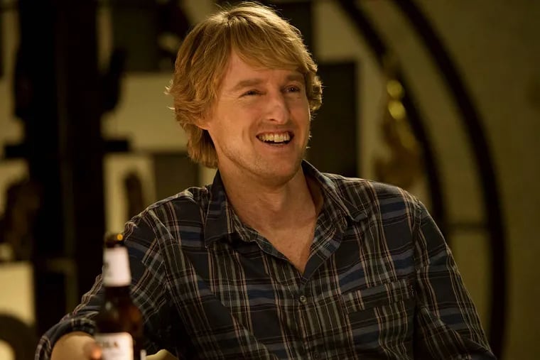 Owen Wilson stars in &quot;No Escape&quot; as a Texas techie who must rescue his wife and girls from a country in the midst of a deadly coup. He says of the role: &quot;I'm not all of a sudden changing into The Rock.&quot; (Weinstein Co.)
