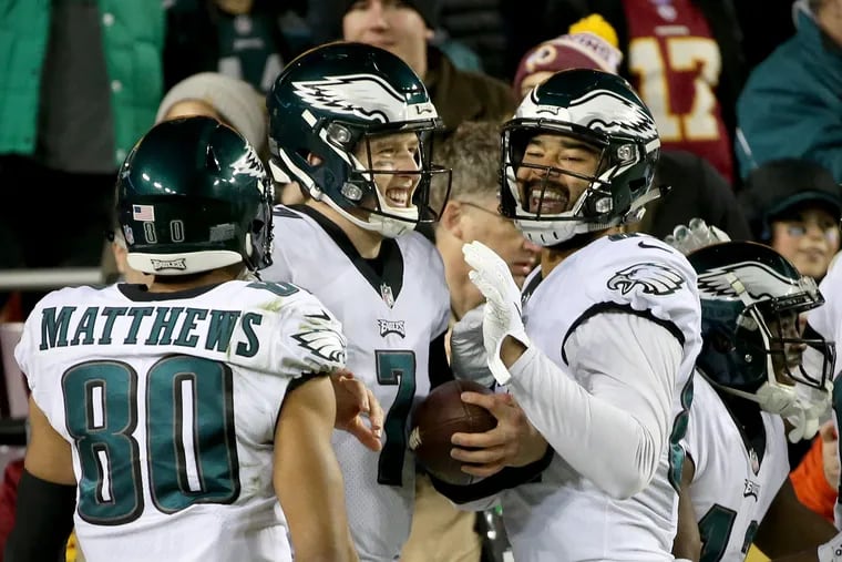 Richard Rodgers, right, shown congratulating Nate Sudfeld for a touchdown pass thrown in the 2018 regular-season finale.