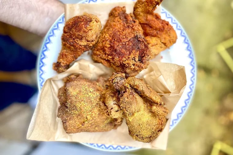 The Ethiopian-inspired fried chicken at Doro Bet in West Philadelphia comes with two seasonings, spicy berbere (top) and milder turmeric and lemon (bottom). The batter is made from teff flour, so this chicken is also gluten-free.
