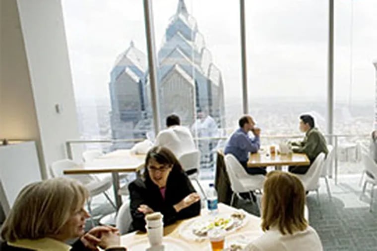It's a cafeteria with a view: Ralph's Cafe serves Comcast employees and their guests from the 43d floor ofthe Comcast Center. Chief executive Brian Roberts says he regards it as the building's heart and soul. (Clem Murray/Inquirer)