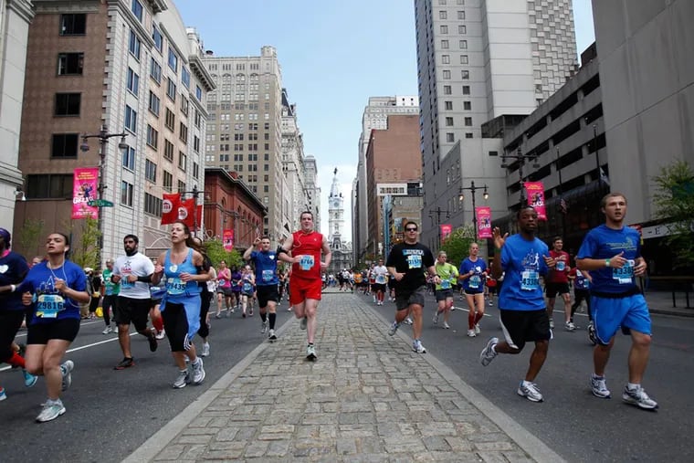 Runners fill the street and the make their way down South Broad Street during the Blue Cross Broad Street Run on May 5, 2013.