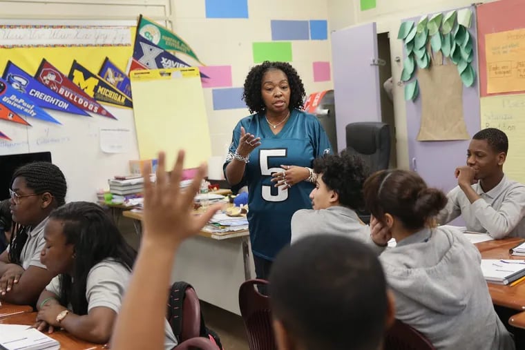 Eighth-grade teacher Carol Marion teaches a lesson about health and wellness at Hartranft Elementary, a school that has implemented Positive Behavior Interventions and Supports with great success.