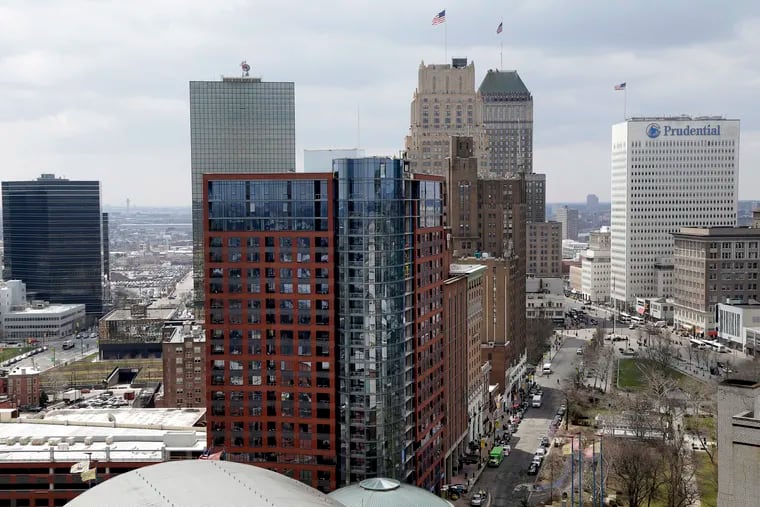 FILE photo shows a part of the skyline in Newark, N.J. A group of five investors bought Gateway Center, near the Penn Station rail hub, for about $300 million, Bloomberg reported. (AP Photo/Seth Wenig, File)