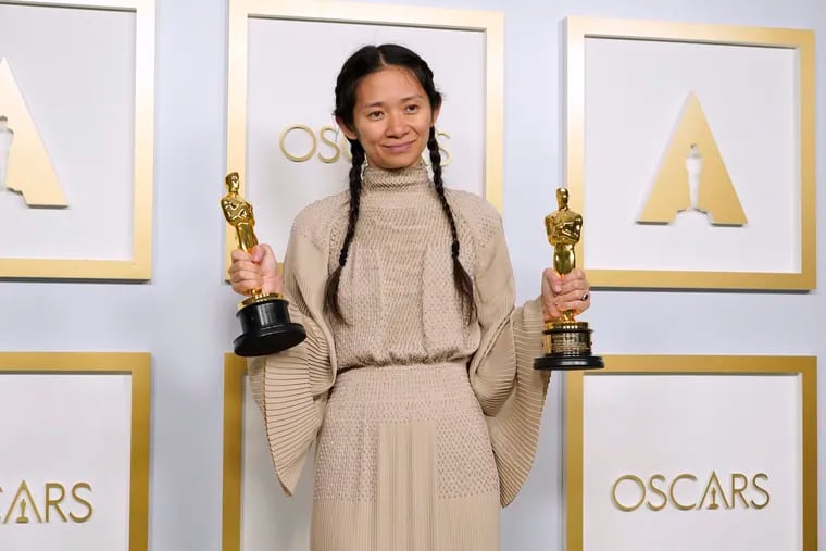 Chloe Zhao, winner of the awards for best picture and director for "Nomadland," poses in the press room at the Oscars on Sunday.