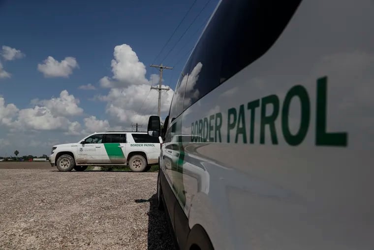 Border patrol vehicles parked on a levy near the Rio Grande, where they constantly patrol for people illegally crossing into the U.S. from Mexico, on June 25, 2018.