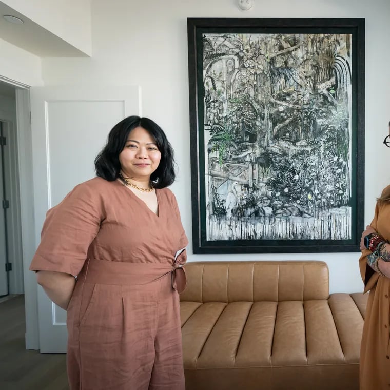 Eileen Teng (left) commissioned a painting by New York artist Antoinette Wysocki (right). Wysocki used charcoal, gouache, and graphite to create the piece inspired by Morris Arboretum.