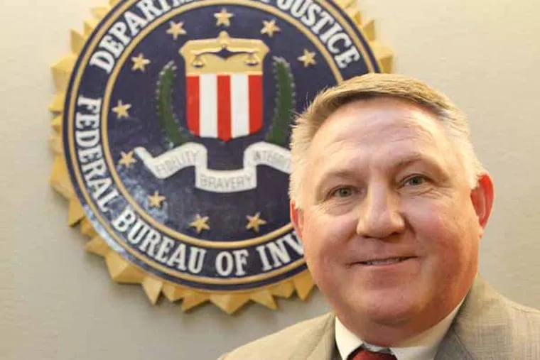 The new Philadelphia FBI Special Agent in Charge Edward Hanko, who started this week, is shwn in the Philadelphia FBI offices. Hanko is a Wilkes-Barre native.  ( CHARLES FOX / Staff Photographer )