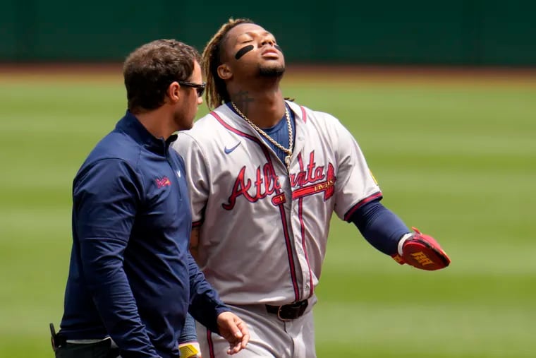 Braves star Ronald Acuña Jr. will miss the rest of the season with a torn ACL in his left knee.
