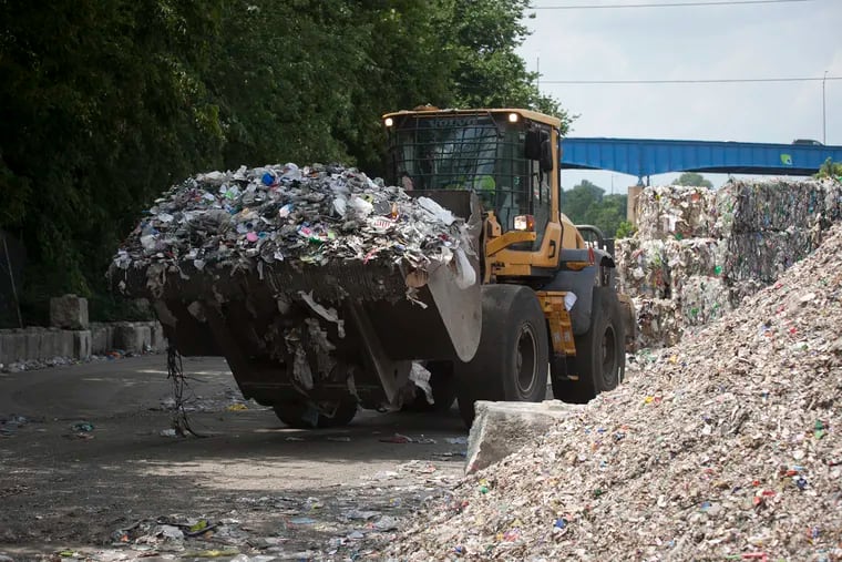 A loader moves waste and recyclables at Republic Services.