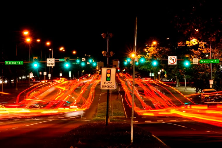 This long exposure photo shows traffic driving on Roosevelt Boulevard in Philadelphia, Wednesday, May 25, 2022.