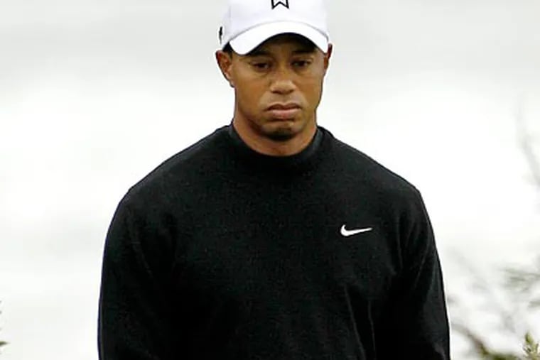Tiger Woods says his health "is better [but] not where I want it." (David J. Phillip/AP)