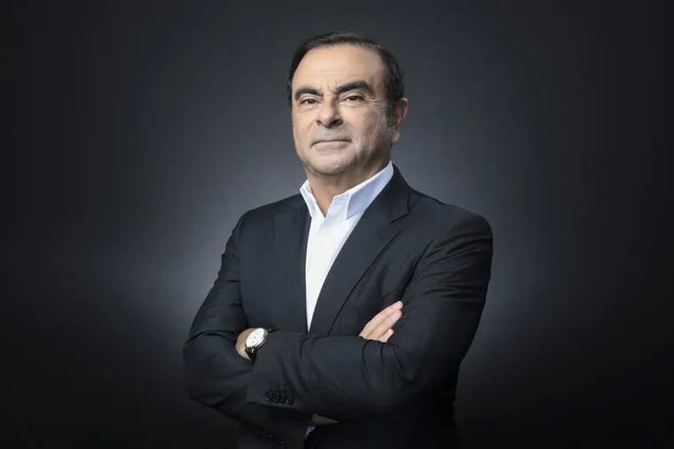 Carlos Ghosn, chairman of the alliance between Renault, Nissan and Mitsubishi Motors, poses for a photograph on the opening day of the World Economic Forum in Davos, Switzerland, on Jan. 23.