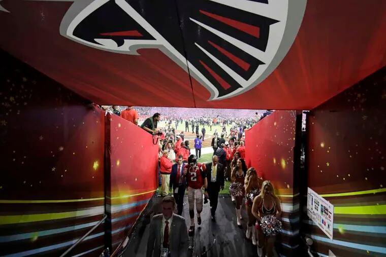 Atlanta Falcons' Matt Ryan walks back to the locker room after the NFL Super Bowl 51 football game loss to the New England Patriots in overtime Sunday, Feb. 5, 2017, in Houston. The Patriots won 34-28. (AP Photo/Tony Gutierrez)