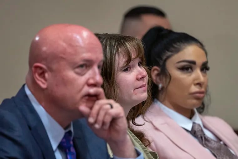 Hannah Gutierrez Reed, center, with her attorney Jason Bowles and paralegal Carmella Sisneros during her sentencing hearing in state district court in Santa Fe, New Mexico, on Monday.