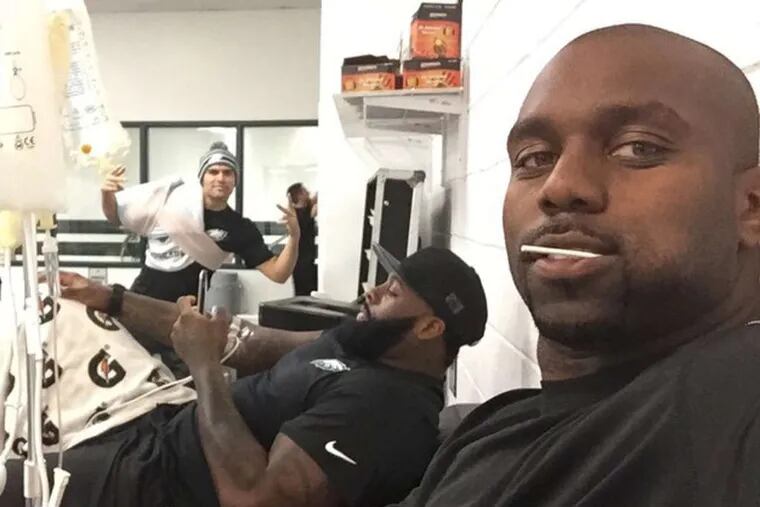 Look who made an appearance in a photo of Trent Cole (right) and JasonPeters in the Eagles’ locker room before 
yesterday’s game. (Trent Cole's Instagram)