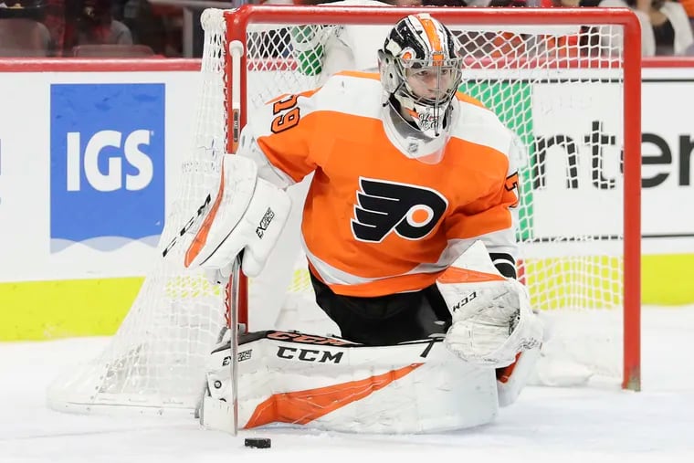 Carter Hart, seen here playing for the Flyers, blanked Great Britain as Team Canada rolled to an 8-0 win Sunday.