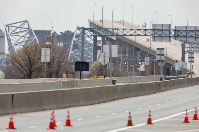 A view from I-695 of what remains of the Francis Scott Key Bridge after it collapsed when a container ship ran into it on the Patapsco River in Baltimore, Maryland on Tuesday.