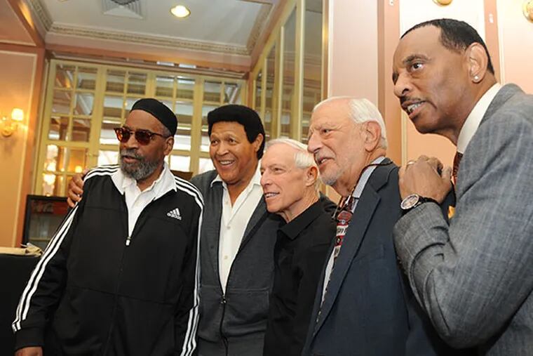 From left, Ken Gamble, Chubby Checker, Jerry Blavat, Joe Tarsia and Earl Young hold plaques on the Philly Walk of Fame during their participation in the Make The Stars Shine promotion for the upcoming season inside the Merriam Theater on Sept. 23, 2014. ( CLEM MURRAY / Staff Photographer )