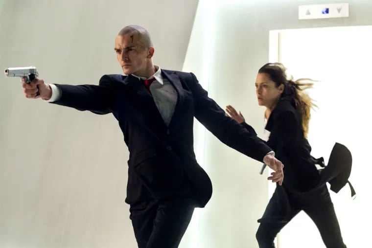 The game is on: Rupert Friend and Hannah Ware in a &quot;Hitman: Agent 47,&quot; a film adaptation of the video game. (REINER BAJO/Twentieth Century Fox)