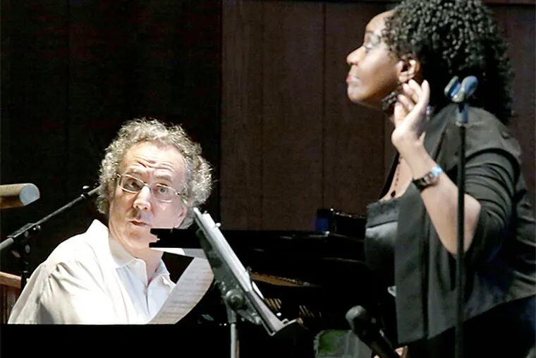 Composer Uri Caine (left) and soprano Barbara Walker perform "The Passion of Octavius Catto" during the "Gospel Meets Symphony" free concert at the Mann Music Center in Philadelphia on Saturday. (Elizabeth Robertson/Staff Photographer)