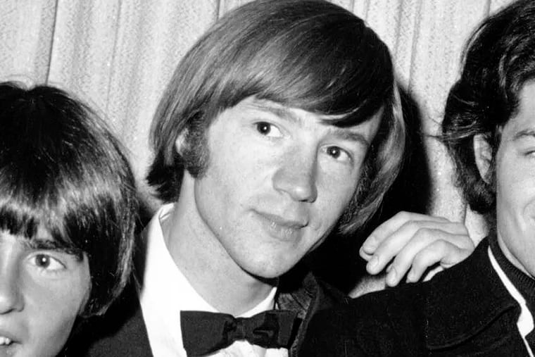 FILE - This June 4, 1967, file photo shows Peter Tork (center) of The Monkees at the 19th Annual Primetime Emmy Awards in Los Angeles. Tork, who rocketed to teen idol fame in 1965 playing the lovably clueless bass guitarist in the made-for-television rock band the Monkees, died Thursday, Feb. 21, 2019, of complications related to cancer, according to his son Ivan Iannoli. He was 77.