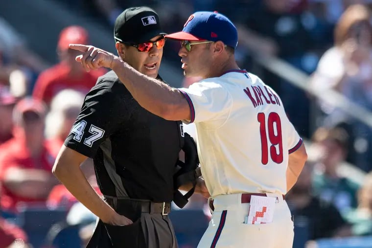 Phillies manager Gabe Kapler is ejected by plate umpire Gabe Morales after arguing about the ejection of  Bryce Harper during the fourth inning.