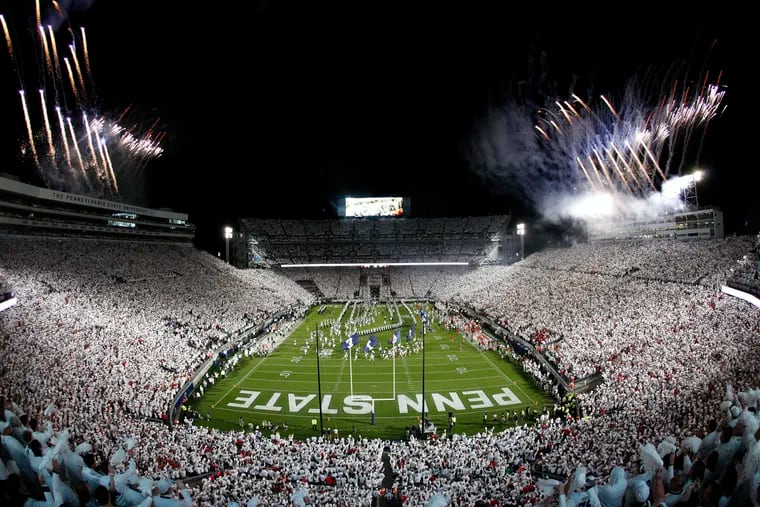 Penn State runs onto the field before their white out game against Ohio State in an NCAA college football game in State College, Pa., Saturday, Sept. 29, 2018. (AP Photo/Chris Knight)