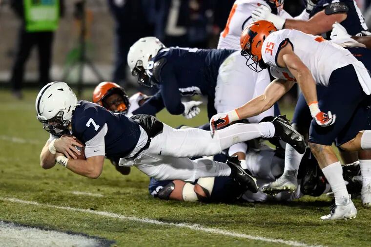 Penn State quarterback Will Levis (7) dives into the end zone to score a touchdown against Illinois on Dec. 19.