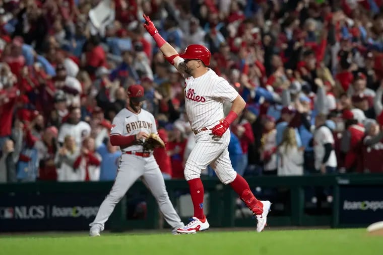 Phillies designated hitter Kyle Schwarber runs the bases after hitting a solo home run during the first inning