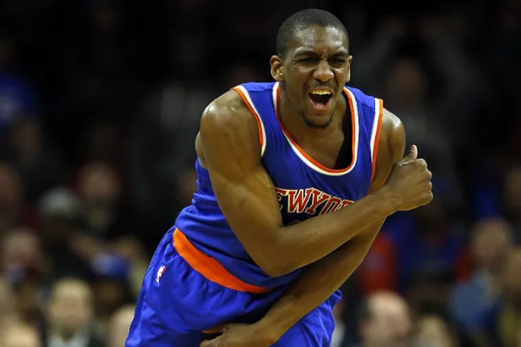 Knicks' Langston Galloway, a Saint Joseph's product, celebrates a late fourth-quarter three-point basket.