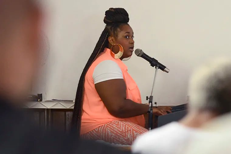 Pottstown singer Candace Benson sings at the piano during Sunday morning services at Bethel A.M.E. Church in West Chester August 3, 2014. She is a finalist on Sunday Best, a gospel singing competition currently airing on BET. ( TOM GRALISH / Staff Photographer )