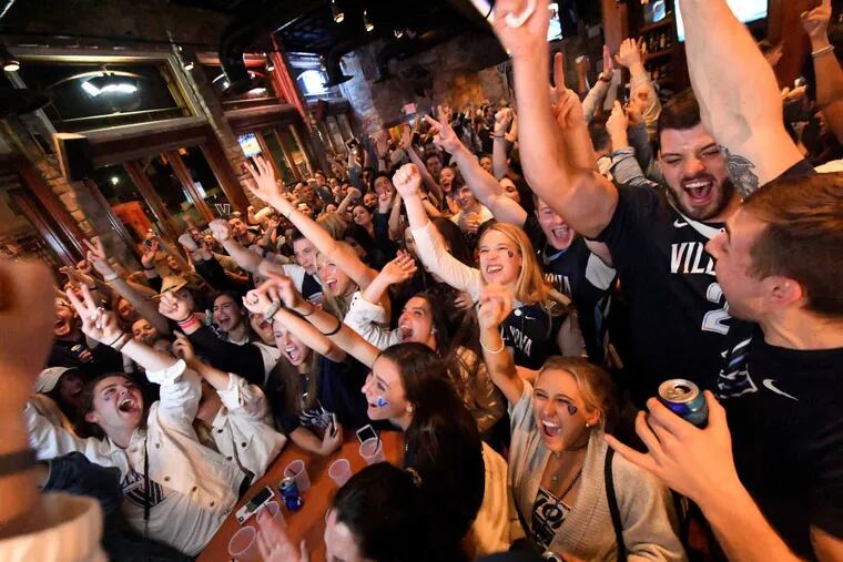 Villanova fans react as they watch the televised NCAA national championship game final against Michigan at Villanova's Connelly Center on Tuesday, April 2, 2018.